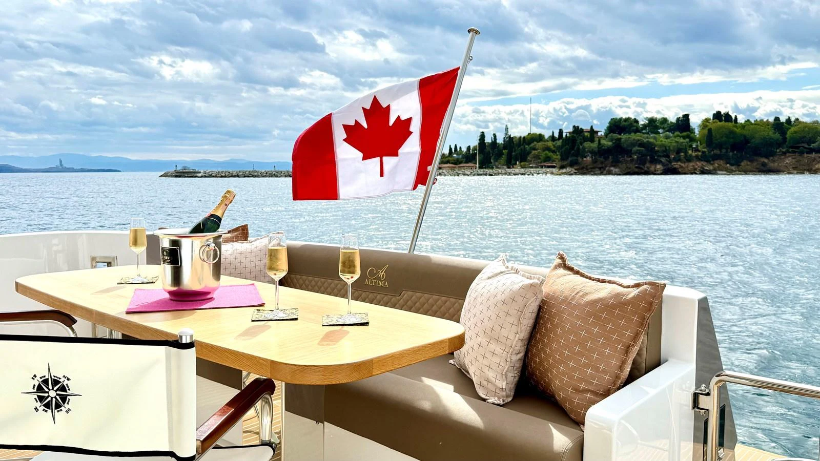 a table with a flag on it aboard SEA AT LAST Yacht for Sale