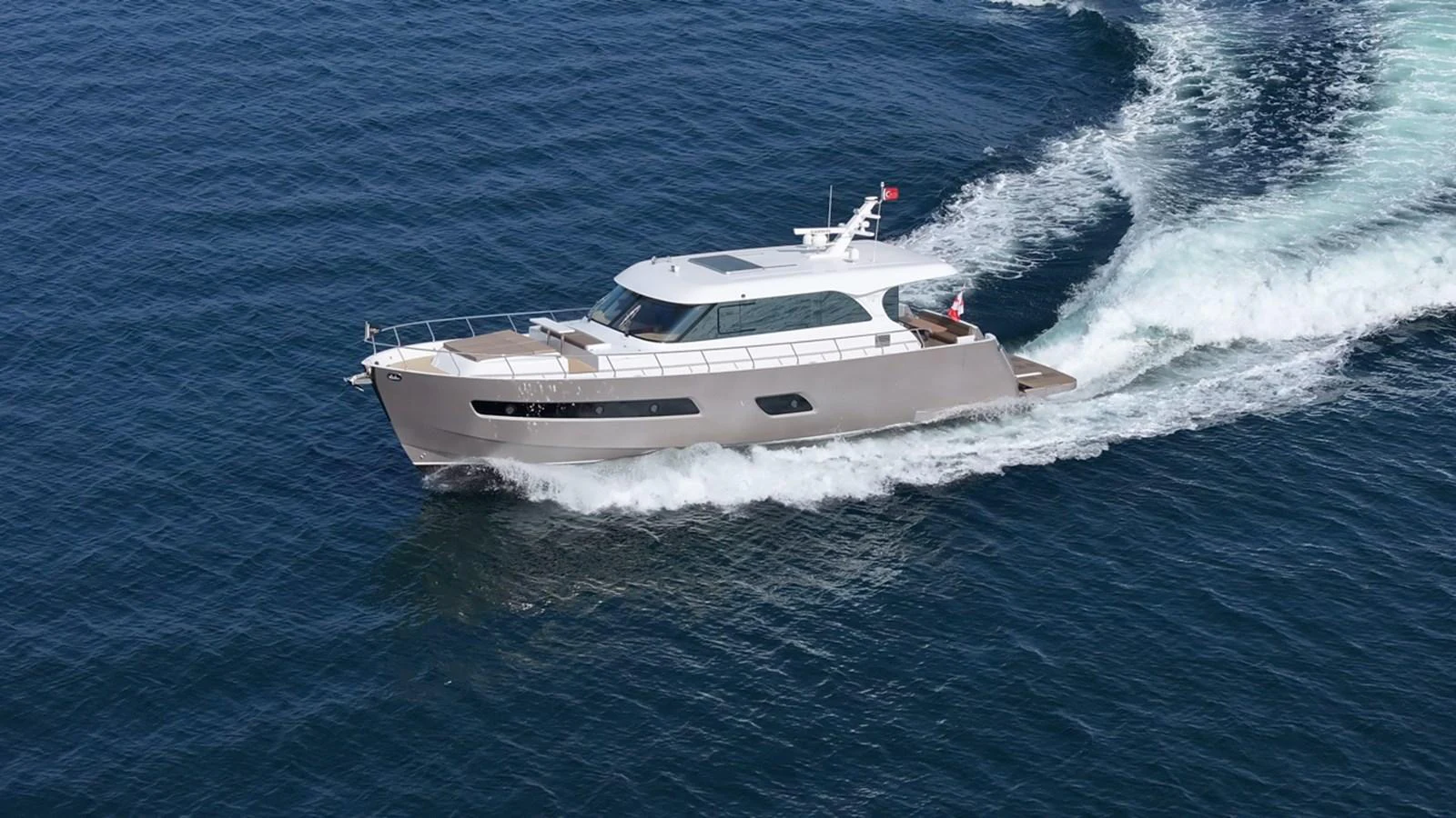 a white yacht on the water aboard SEA AT LAST Yacht for Sale