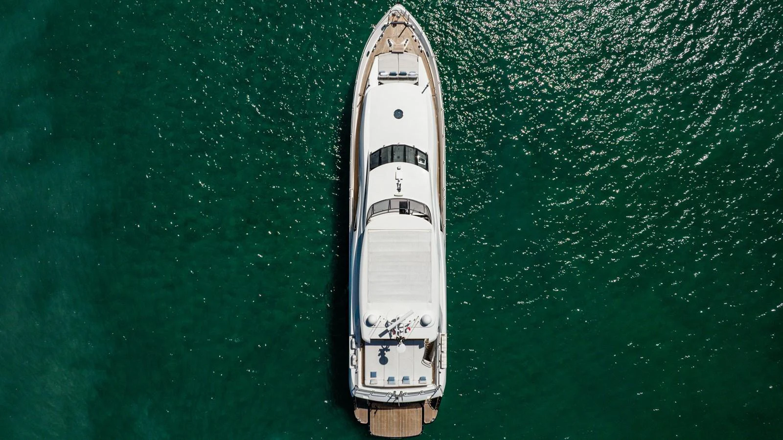 a white ship in the water aboard PRECIOSO Yacht for Sale