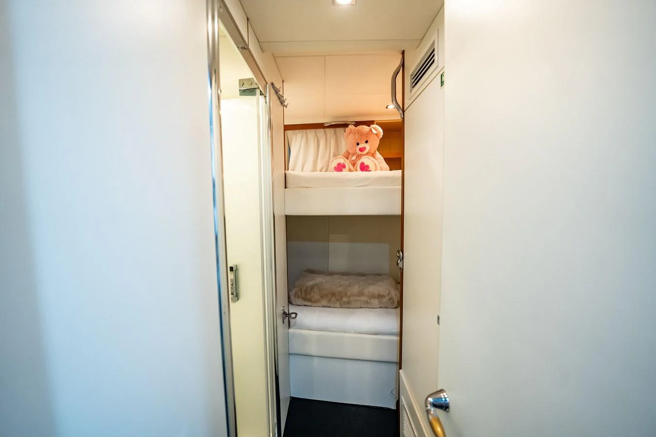 a baby in a white bathtub aboard PRECIOSO Yacht for Sale