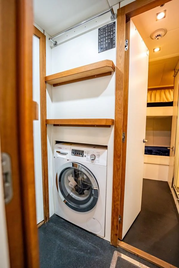 a white washing machine aboard PRECIOSO Yacht for Sale