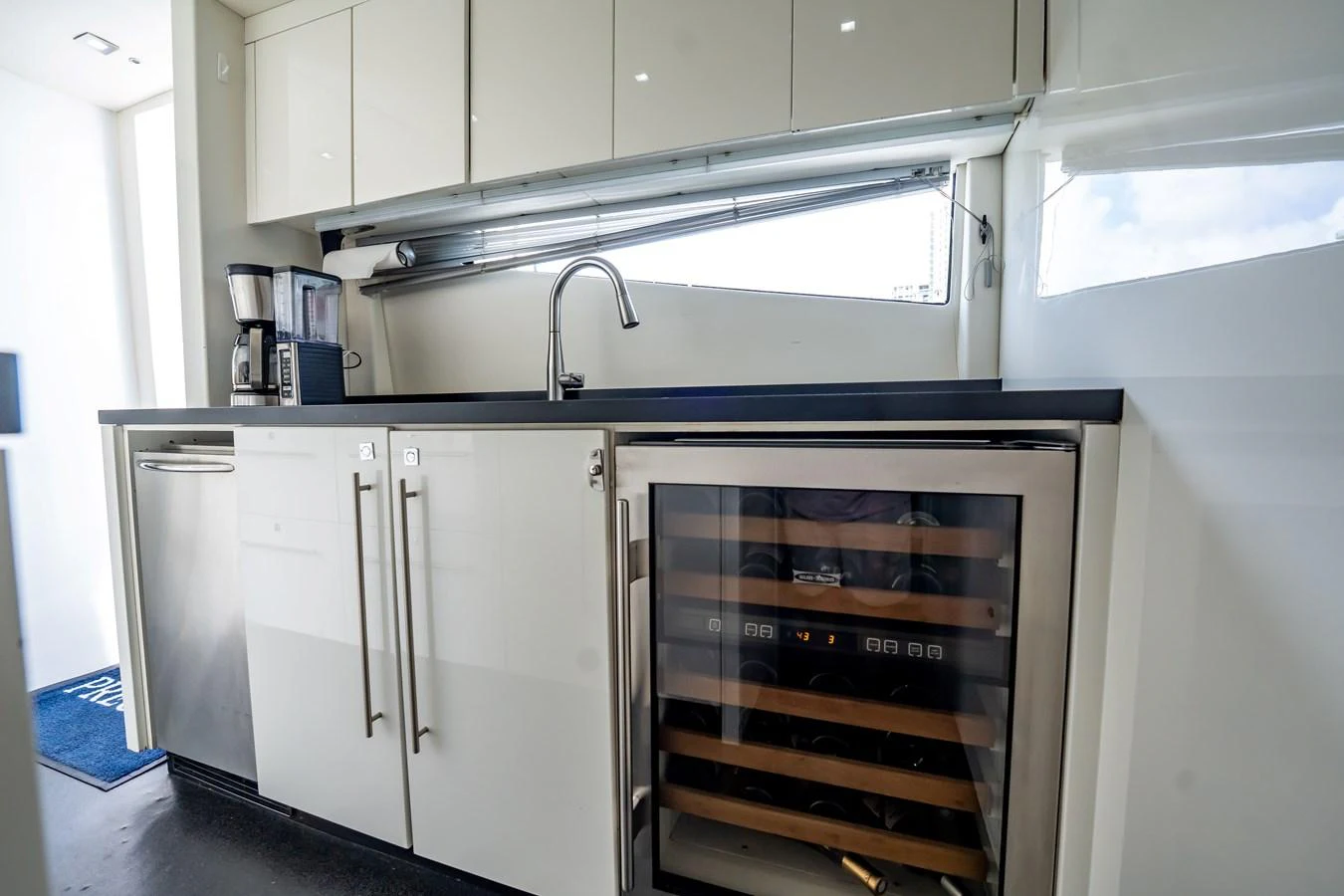 a kitchen with stainless steel appliances aboard PRECIOSO Yacht for Sale