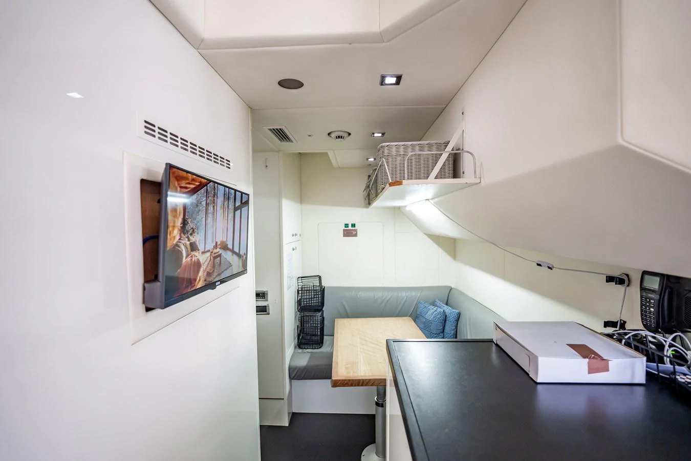 a room with a couch and a table aboard PRECIOSO Yacht for Sale