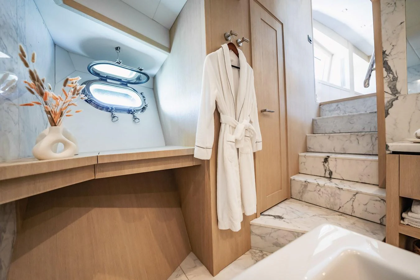 a robe on a door aboard PRECIOSO Yacht for Sale