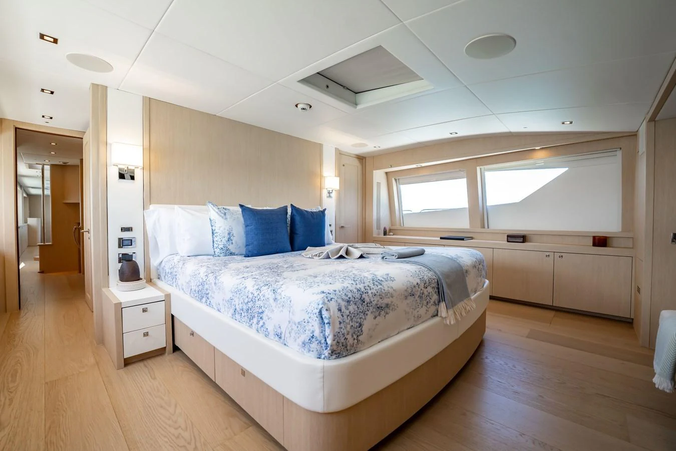 a large bedroom with a large bed aboard PRECIOSO Yacht for Sale