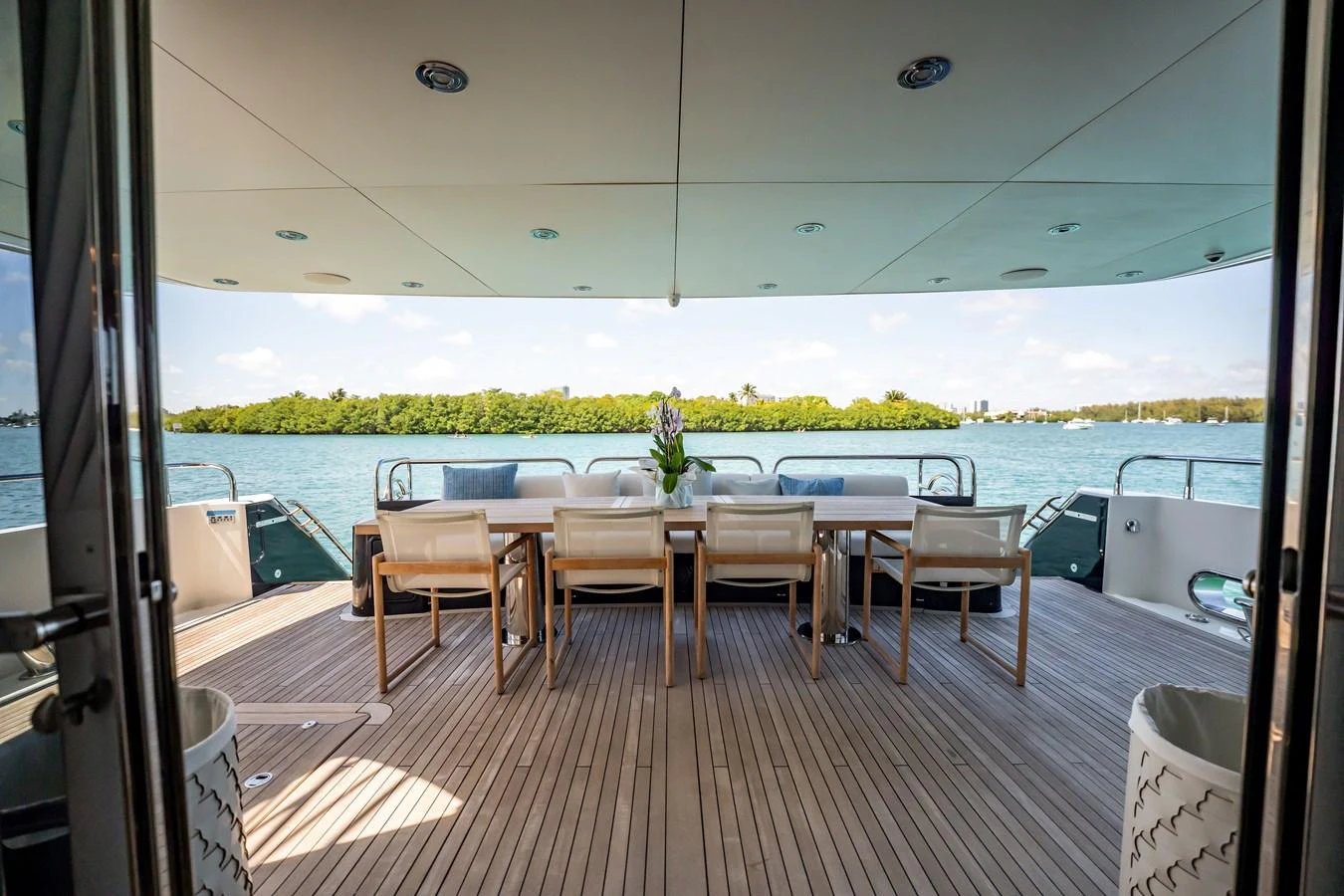 a room with a table and chairs aboard PRECIOSO Yacht for Sale