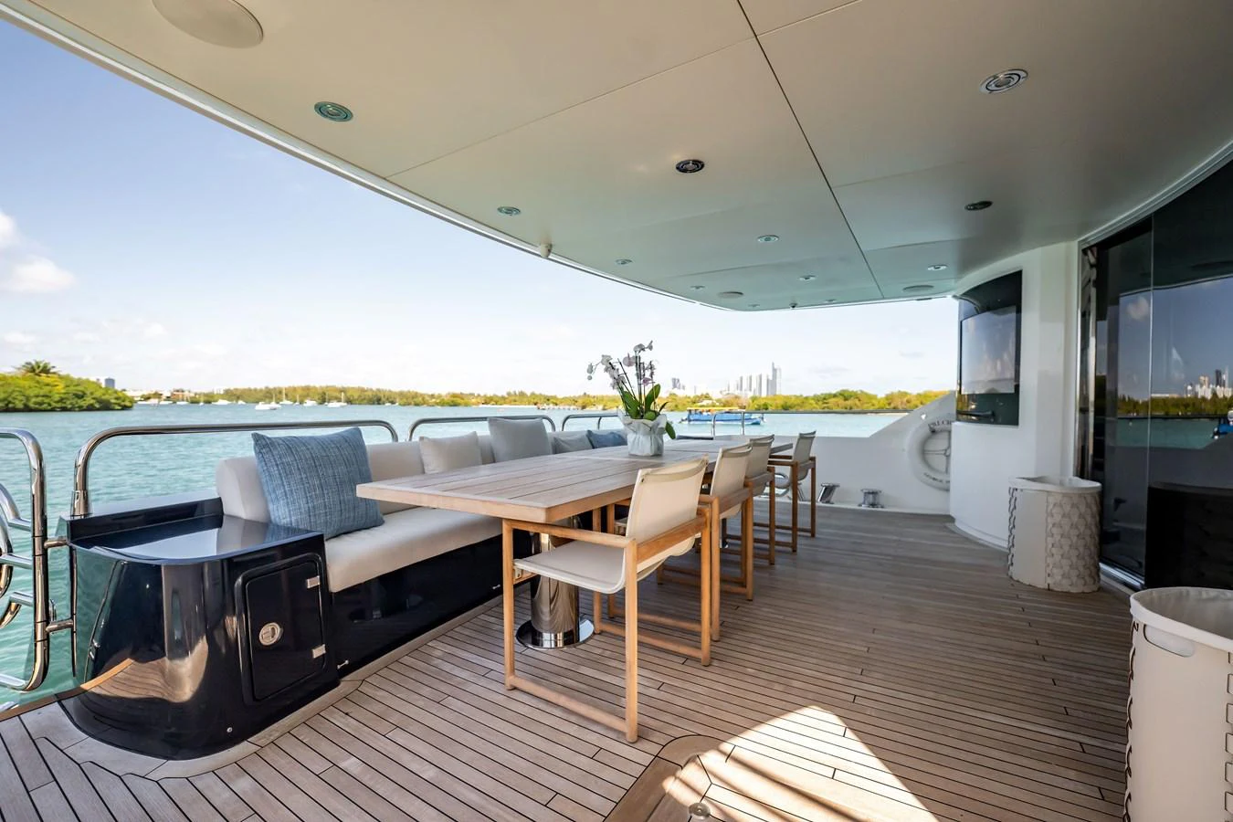 a room with a table and chairs aboard PRECIOSO Yacht for Sale