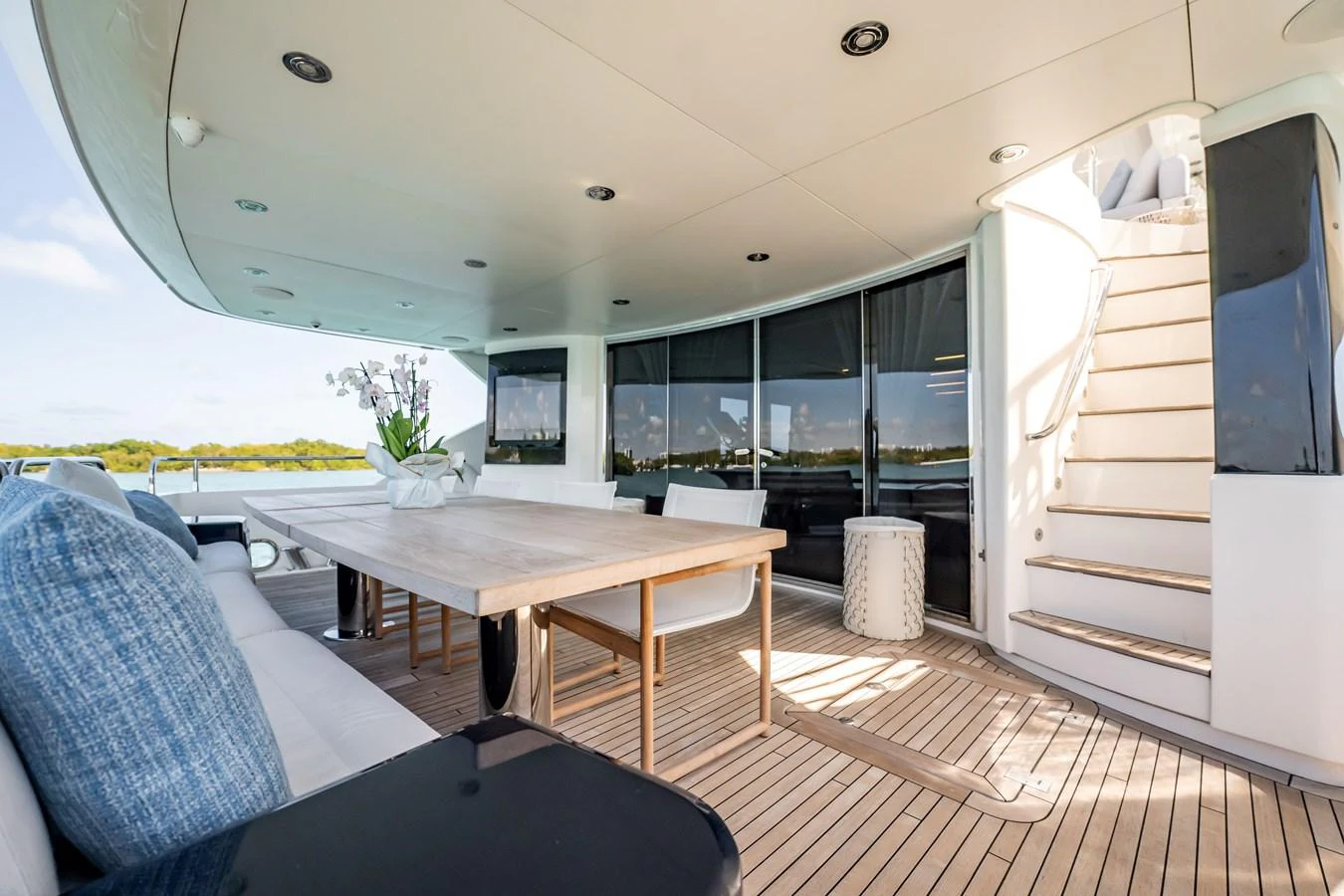 a room with a table and chairs aboard PRECIOSO Yacht for Sale
