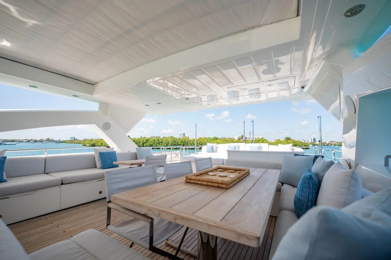 a room with a table and chairs aboard PRECIOSO Yacht for Sale