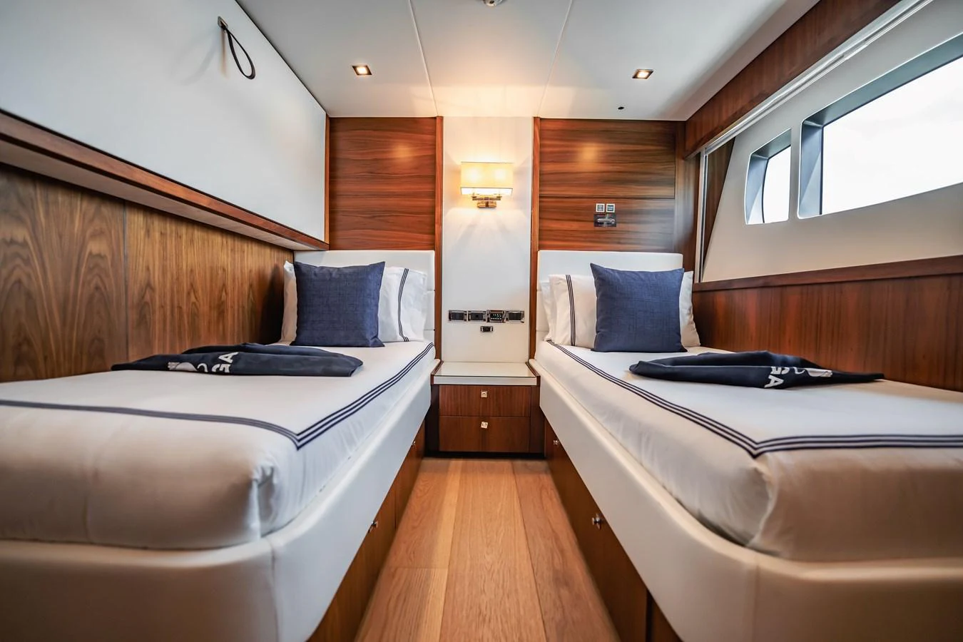 a room with two beds aboard PRECIOSO Yacht for Sale