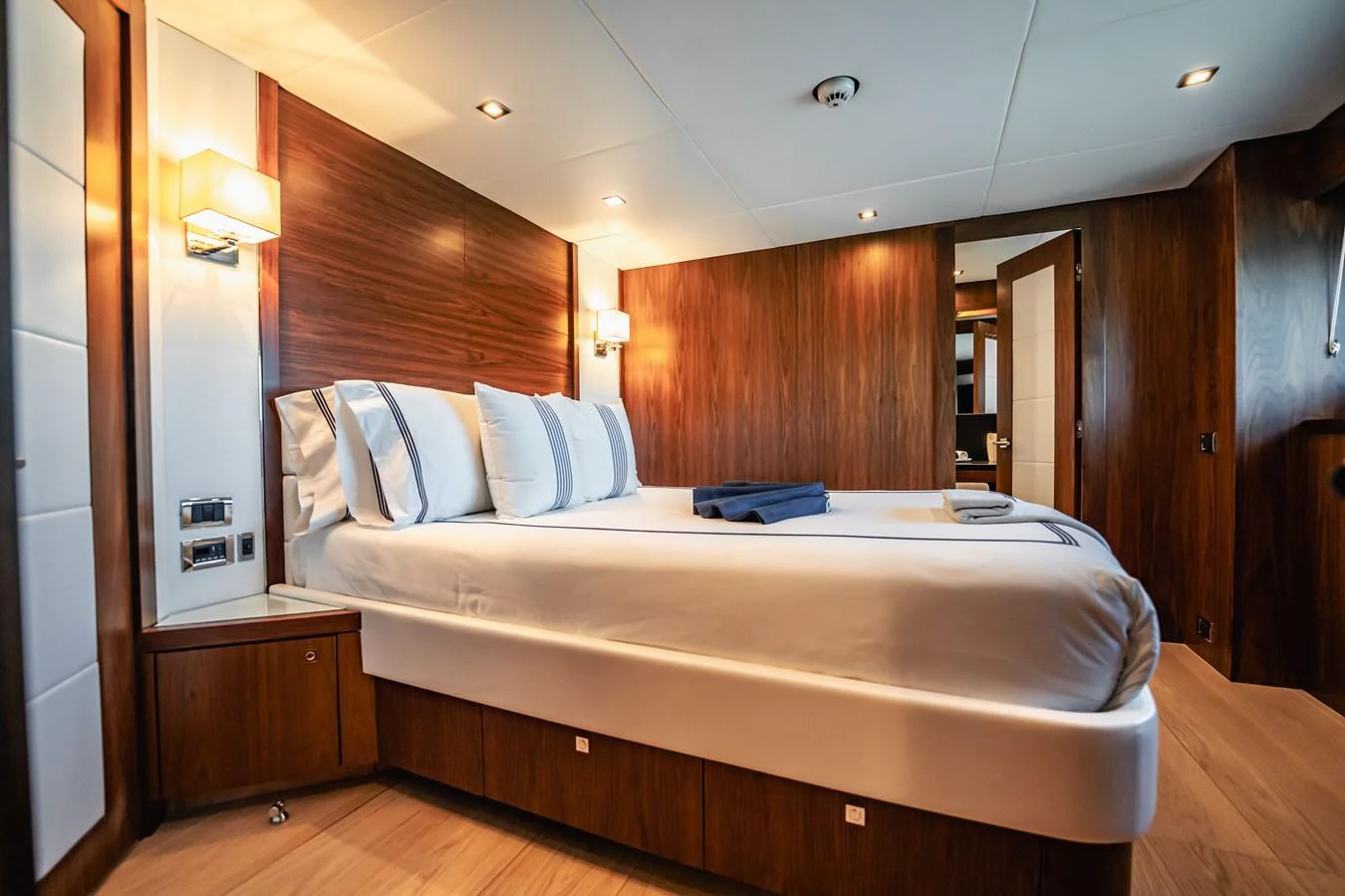a bed in a room aboard PRECIOSO Yacht for Sale