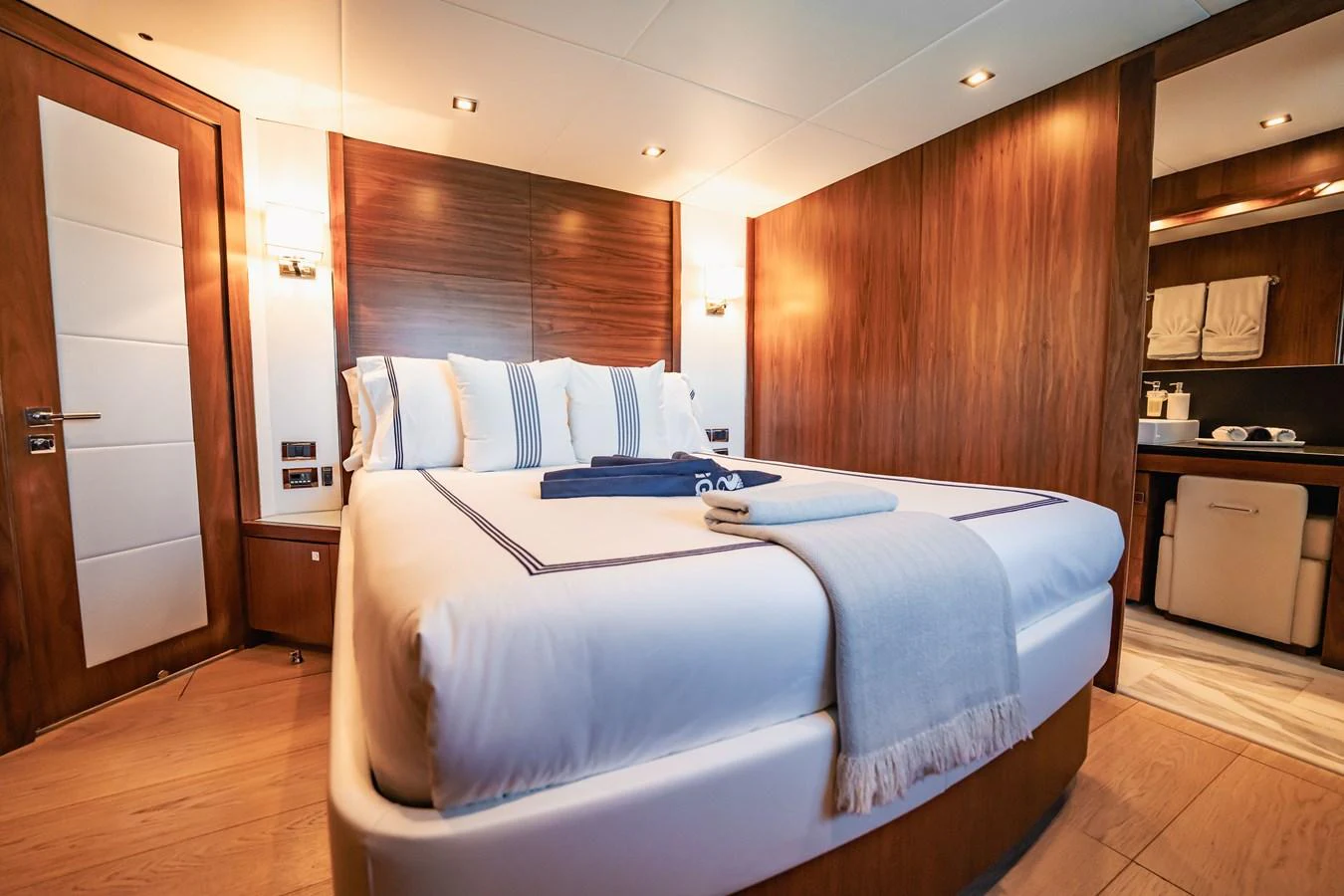 a bed in a room aboard PRECIOSO Yacht for Sale