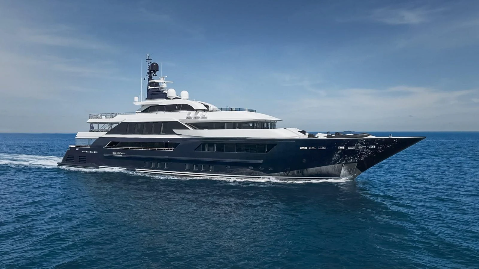 a large white boat aboard ODYSSEY Yacht for Sale