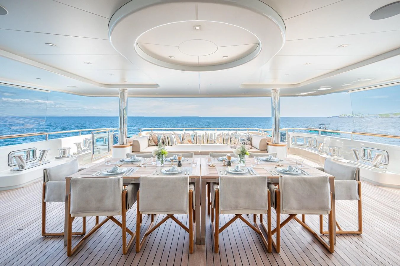 a table set for a dinner party aboard ODYSSEY Yacht for Sale