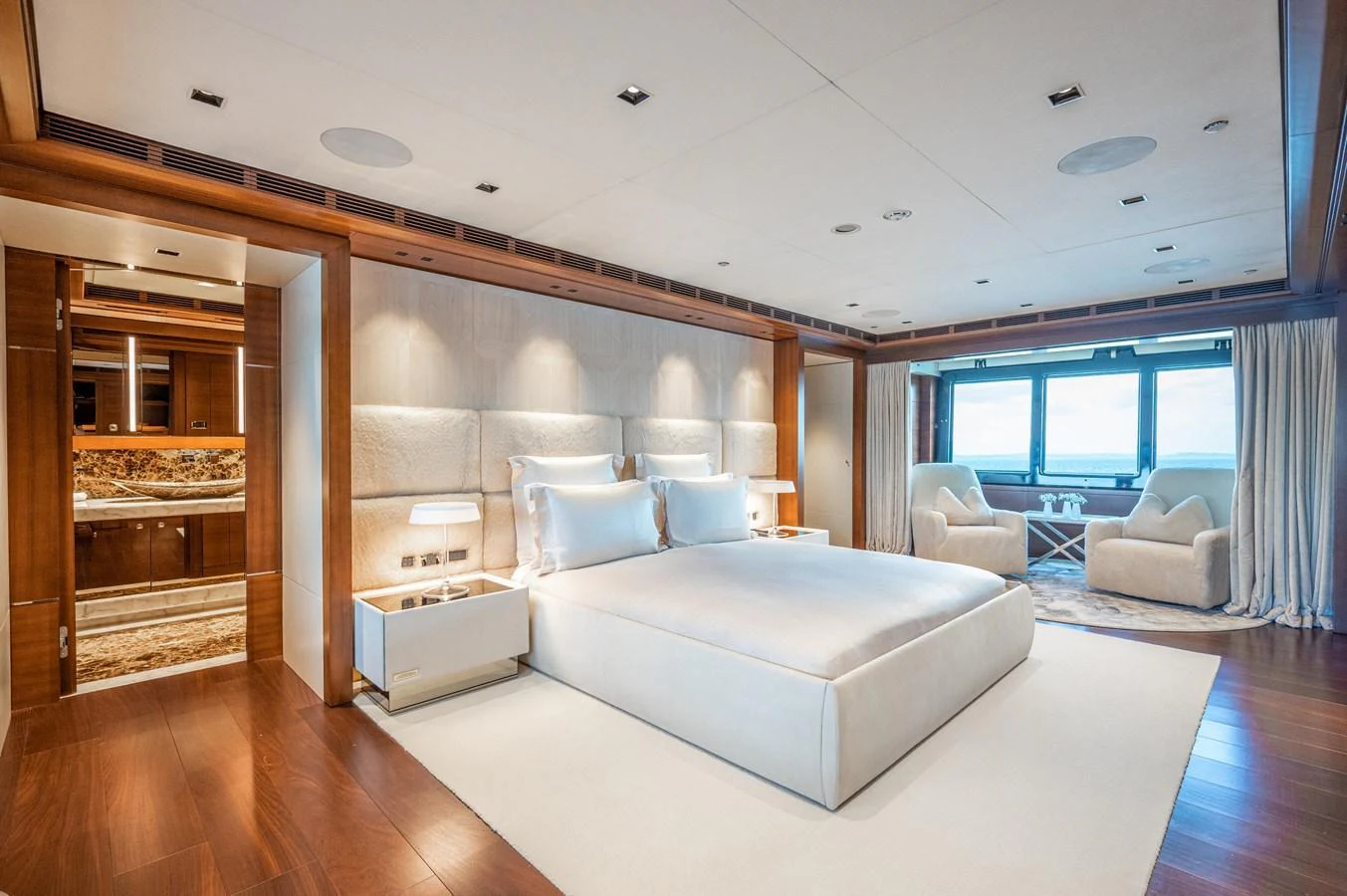 a room with a bed and a couch aboard ODYSSEY Yacht for Sale