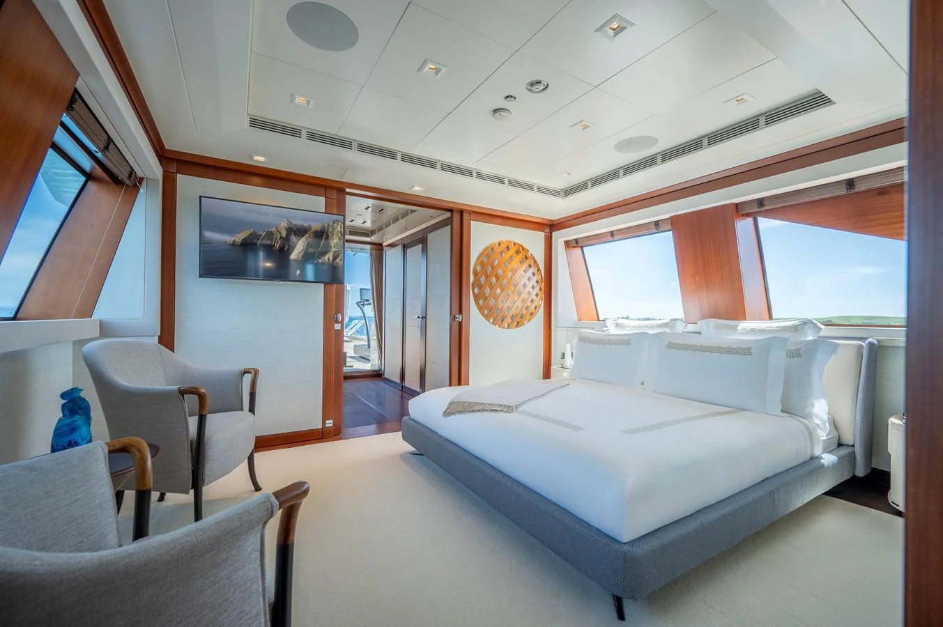 a room with couches and chairs aboard ODYSSEY Yacht for Sale