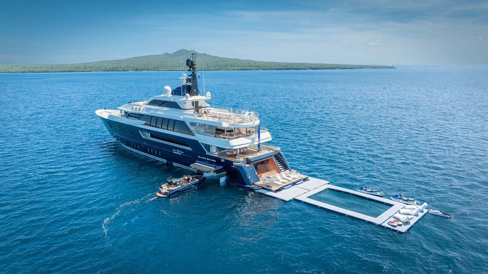 a large ship in the water aboard ODYSSEY Yacht for Sale
