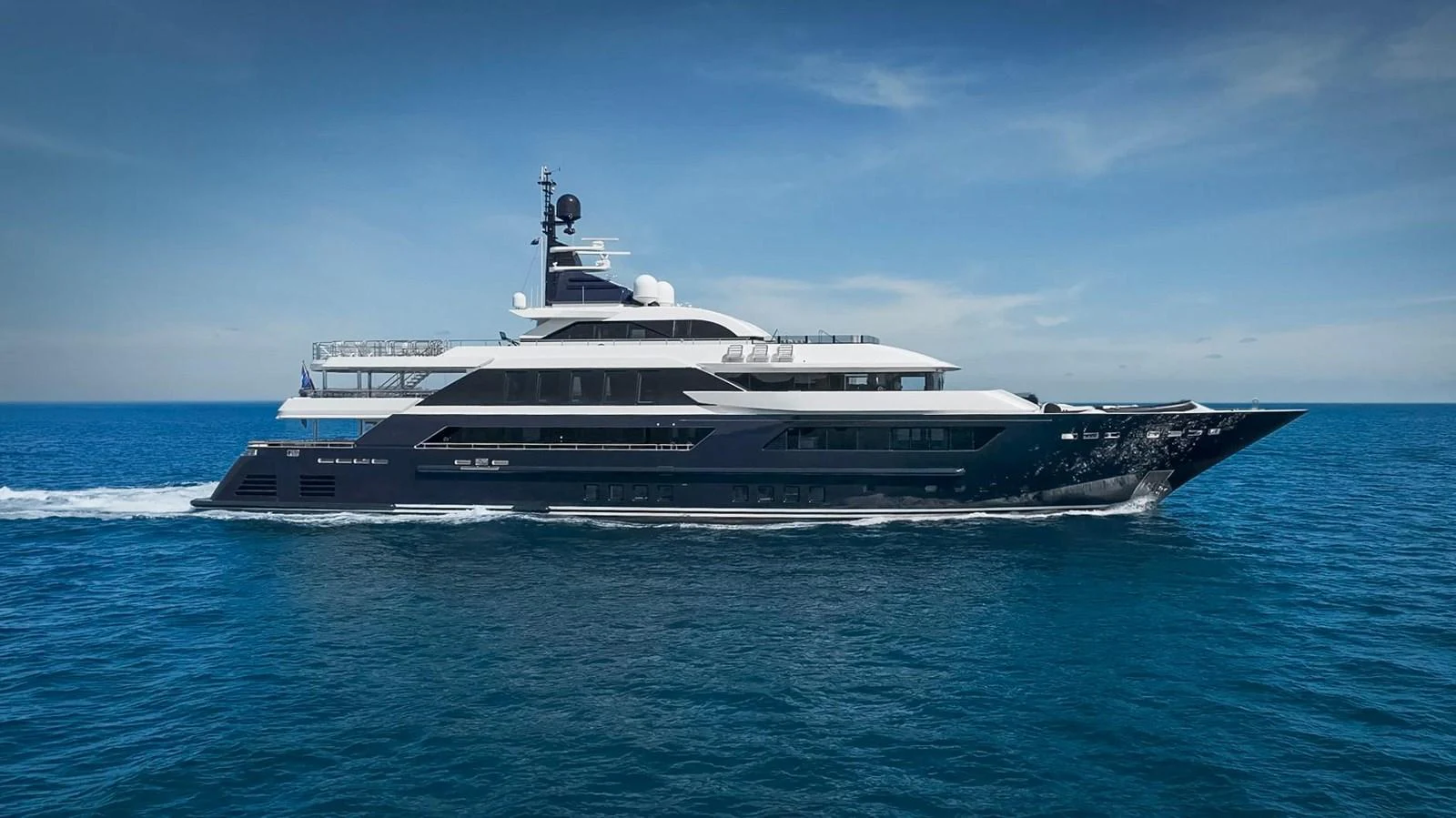 a large ship in the water aboard ODYSSEY Yacht for Sale