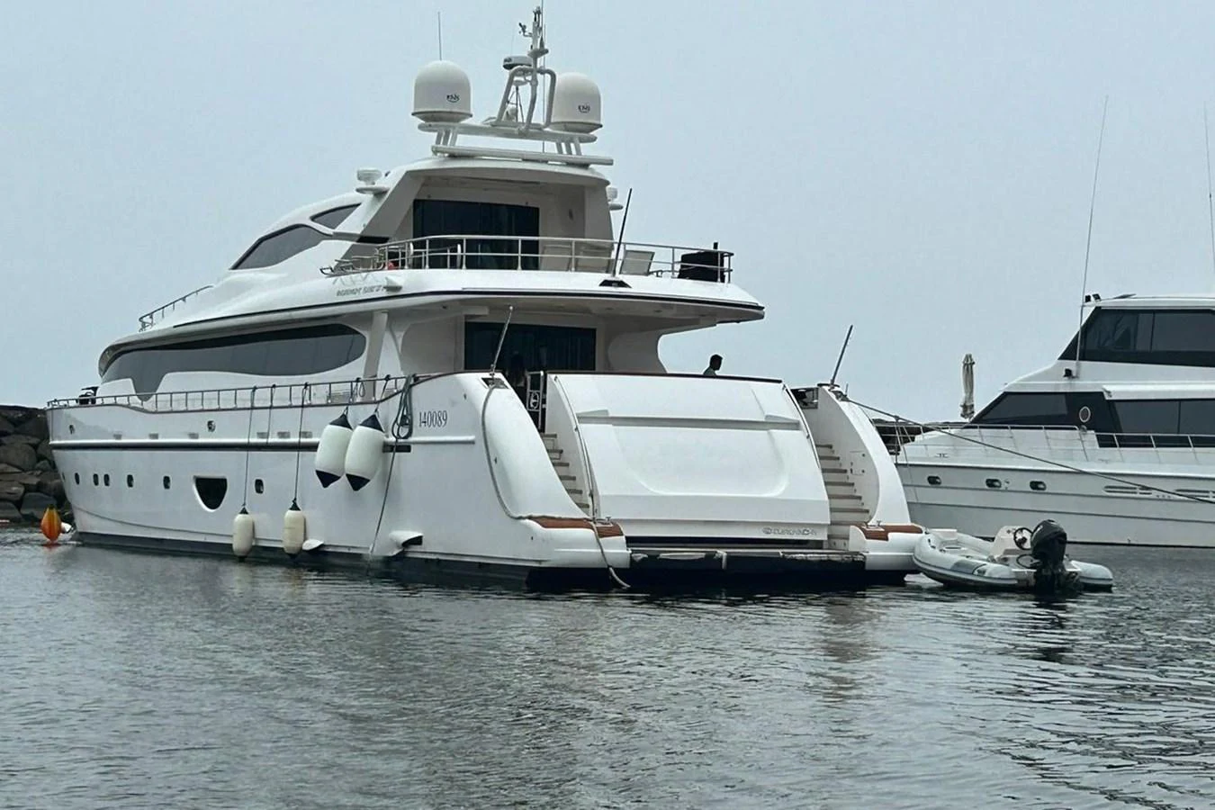 a large white boat in the water aboard SUNSHINE Yacht for Sale