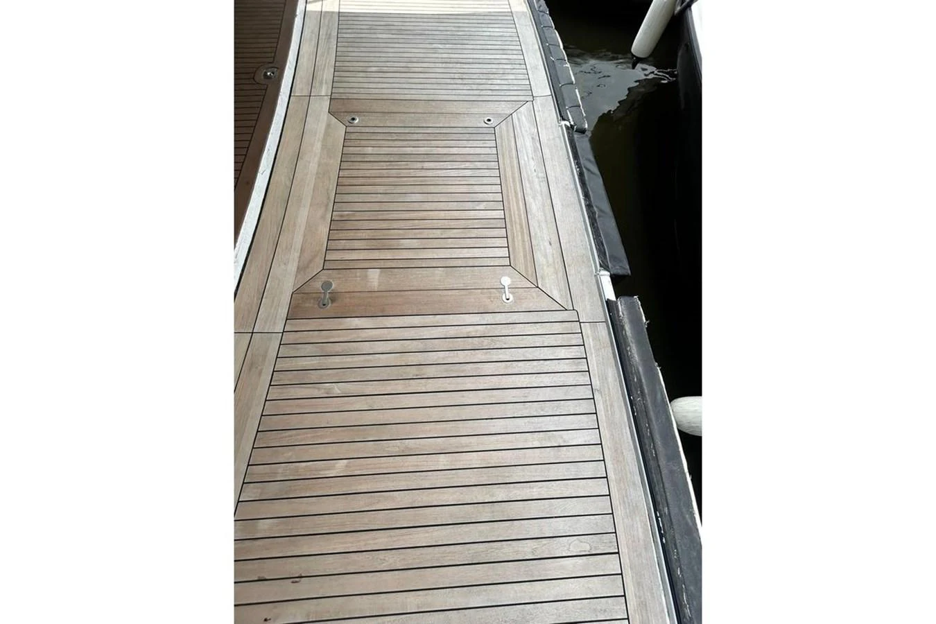 a wooden bridge with a railing aboard SUNSHINE Yacht for Sale