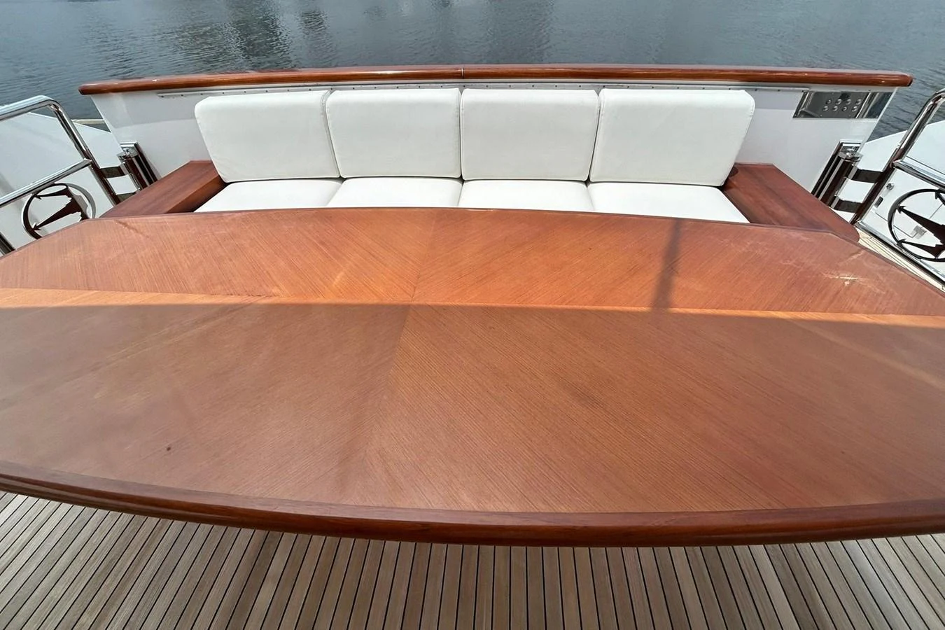 a wooden table with a white pillow on it aboard SUNSHINE Yacht for Sale