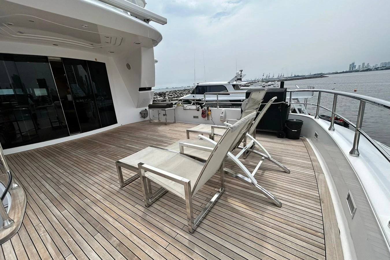 a deck with a chair on it aboard SUNSHINE Yacht for Sale