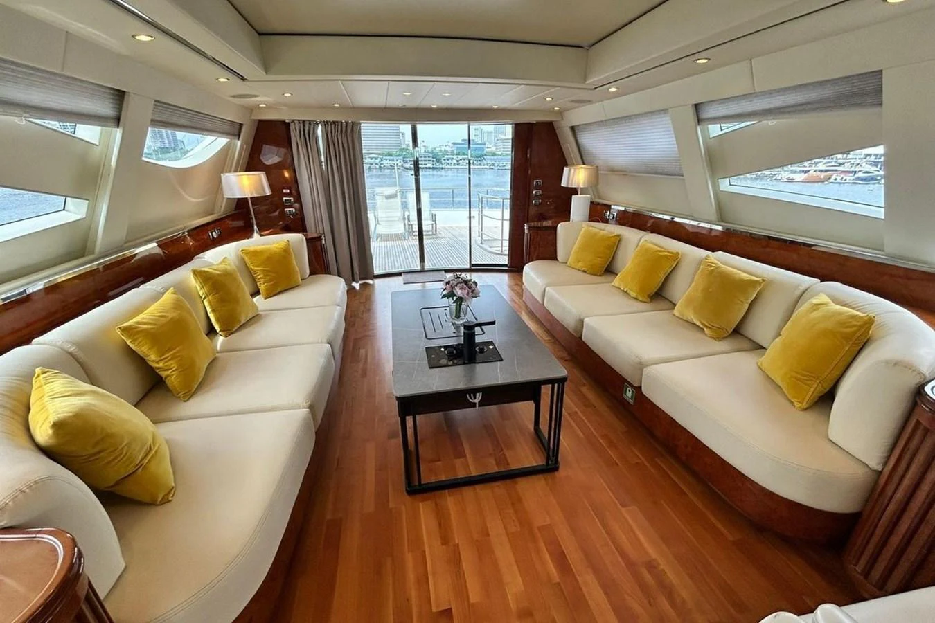 a living room with a large window aboard SUNSHINE Yacht for Sale