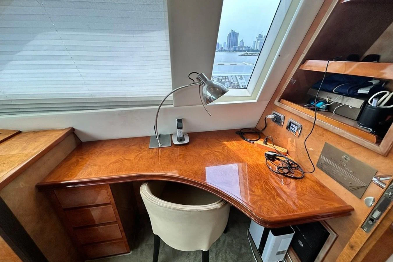 a desk with a computer and a chair aboard SUNSHINE Yacht for Sale