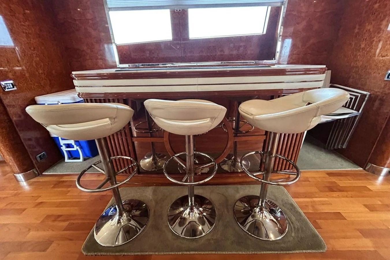 a table with stools and a sink aboard SUNSHINE Yacht for Sale