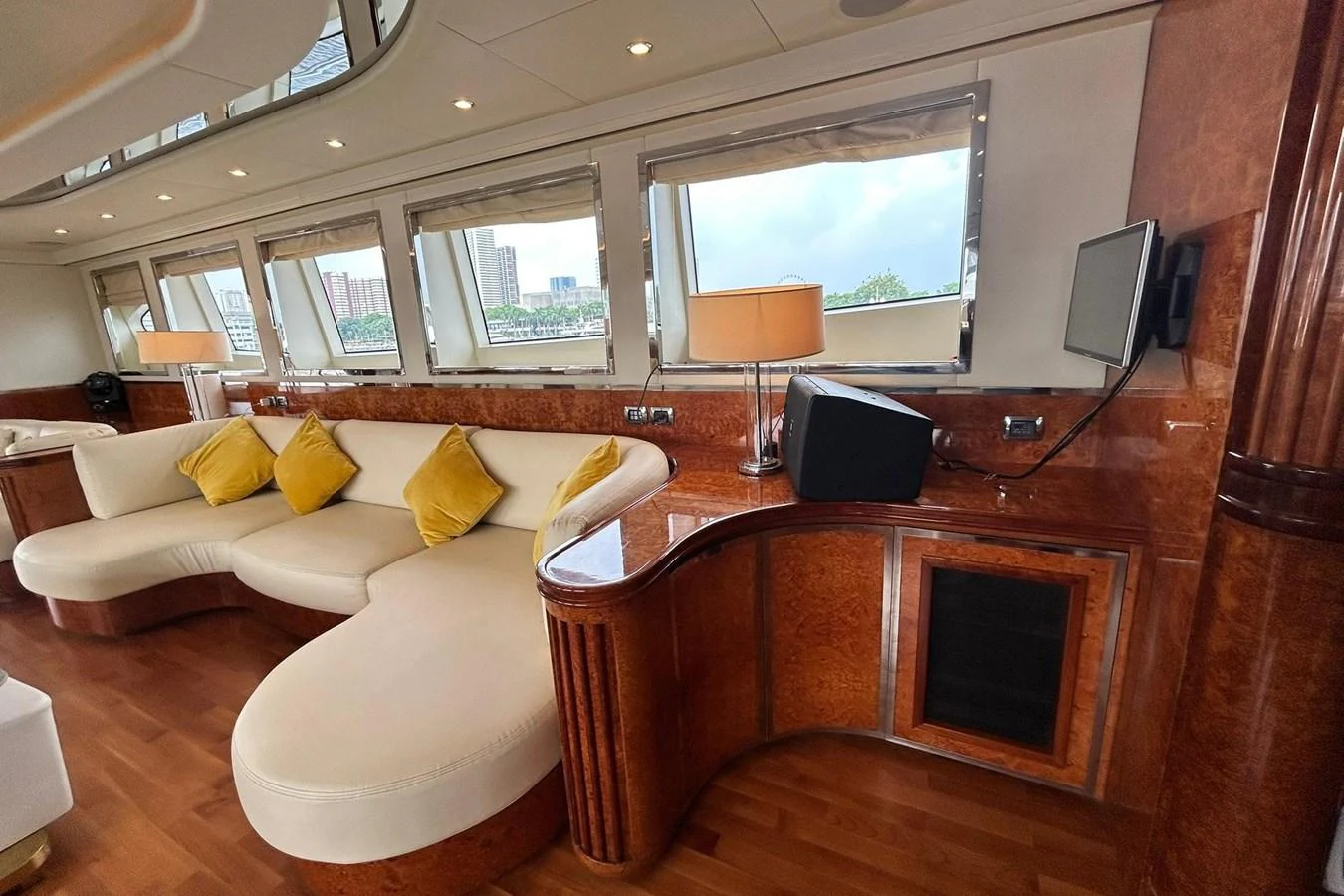 a living room with a fireplace aboard SUNSHINE Yacht for Sale