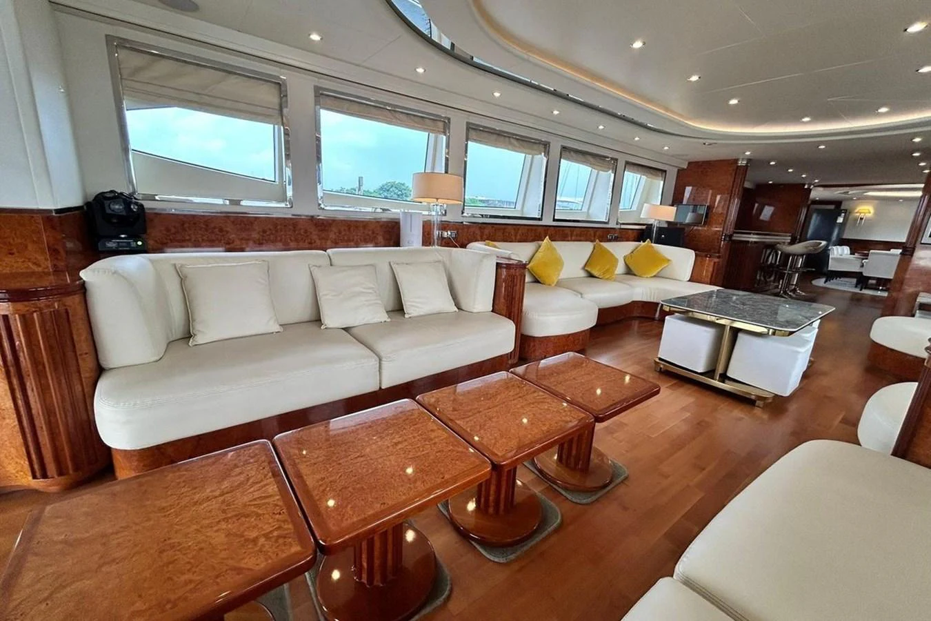 a living room with a couch and a table aboard SUNSHINE Yacht for Sale