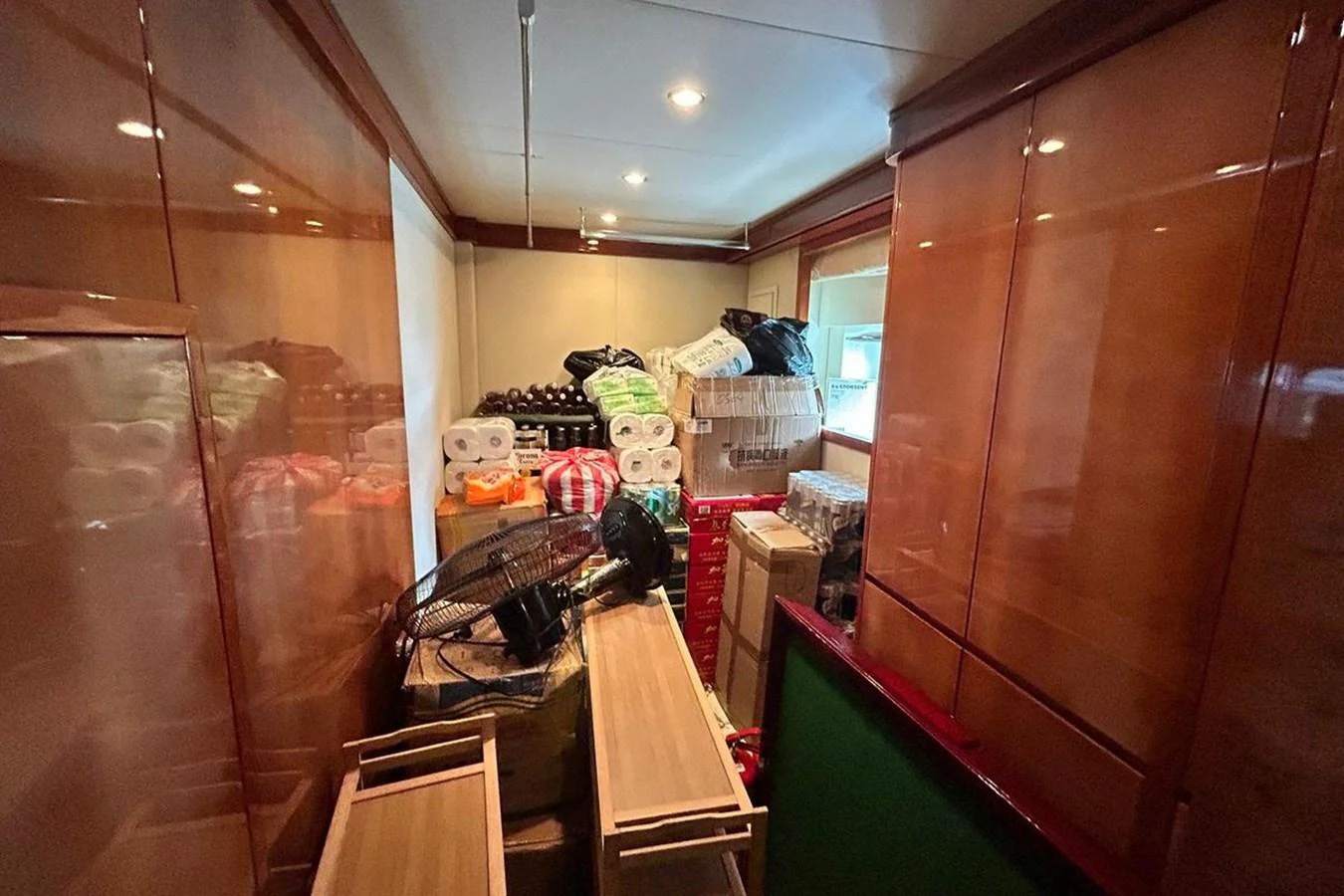 a room with a lot of items in it aboard SUNSHINE Yacht for Sale
