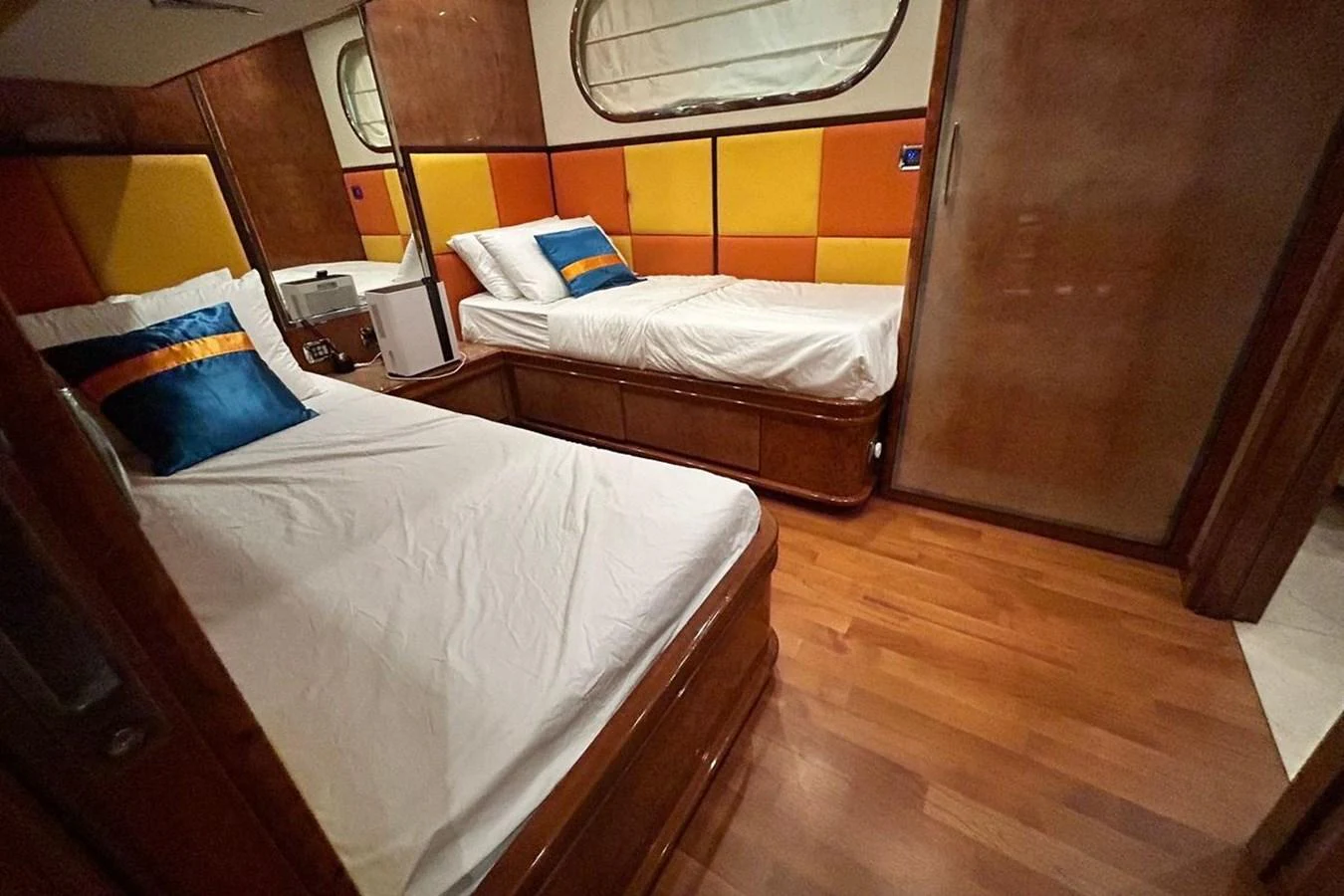 a room with two beds aboard SUNSHINE Yacht for Sale