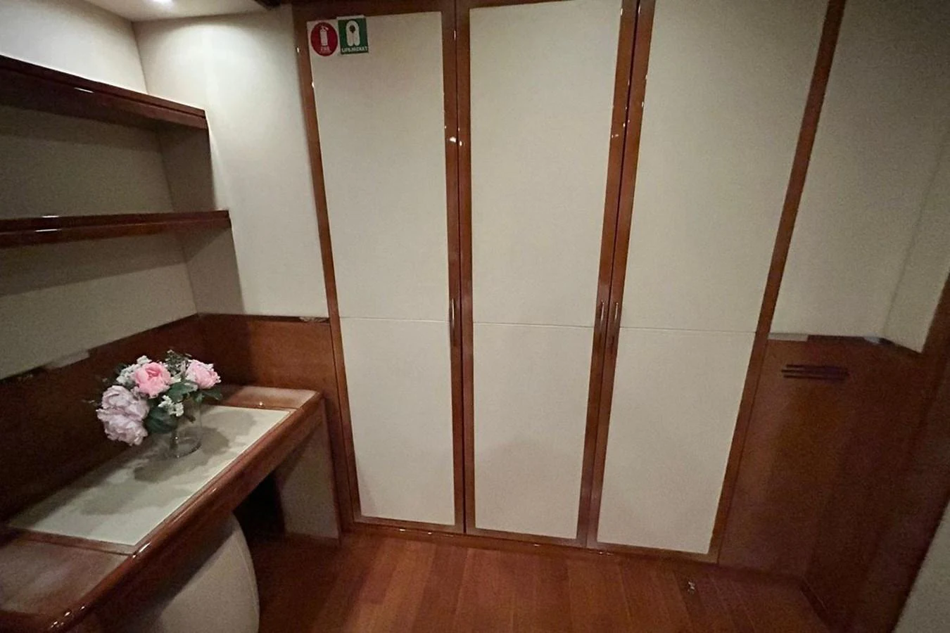 a room with a table and a flower pot on the table aboard SUNSHINE Yacht for Sale
