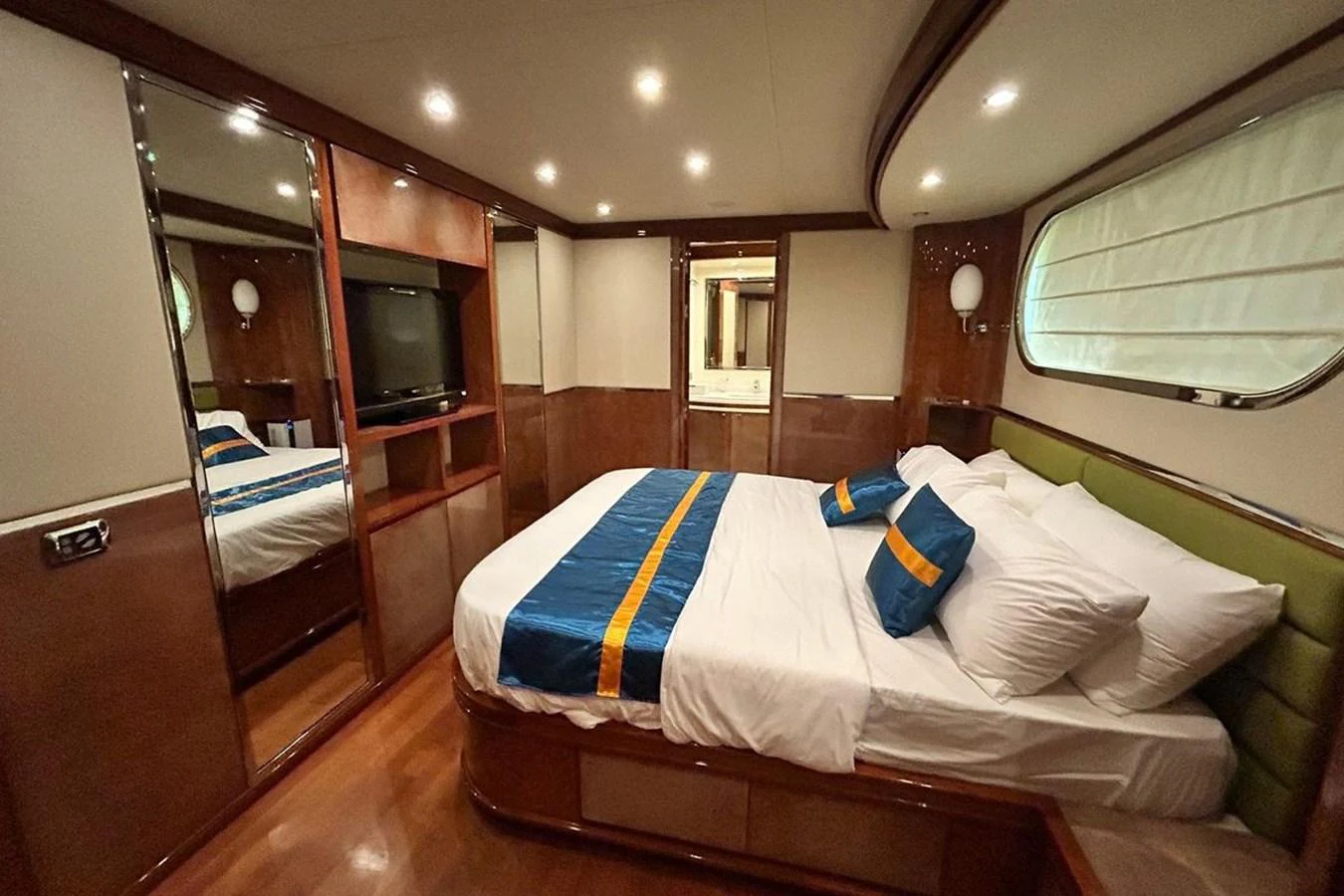 a bed in a room aboard SUNSHINE Yacht for Sale