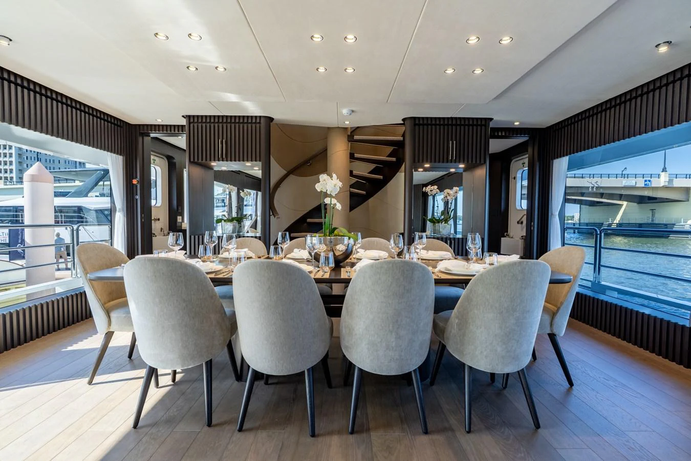a large dining table in a room aboard RESONANCE Yacht for Sale