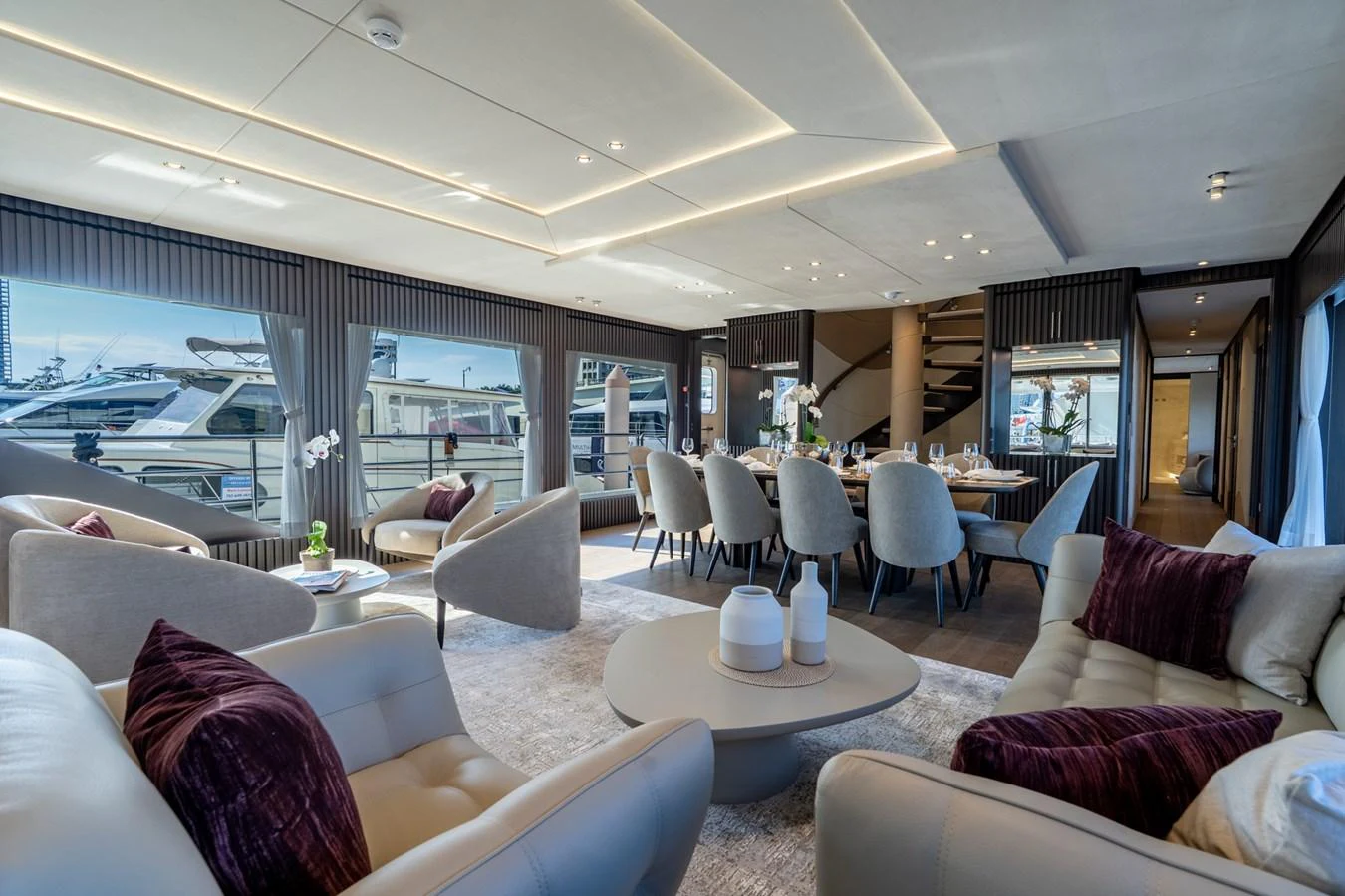 a living room with a large window aboard RESONANCE Yacht for Sale