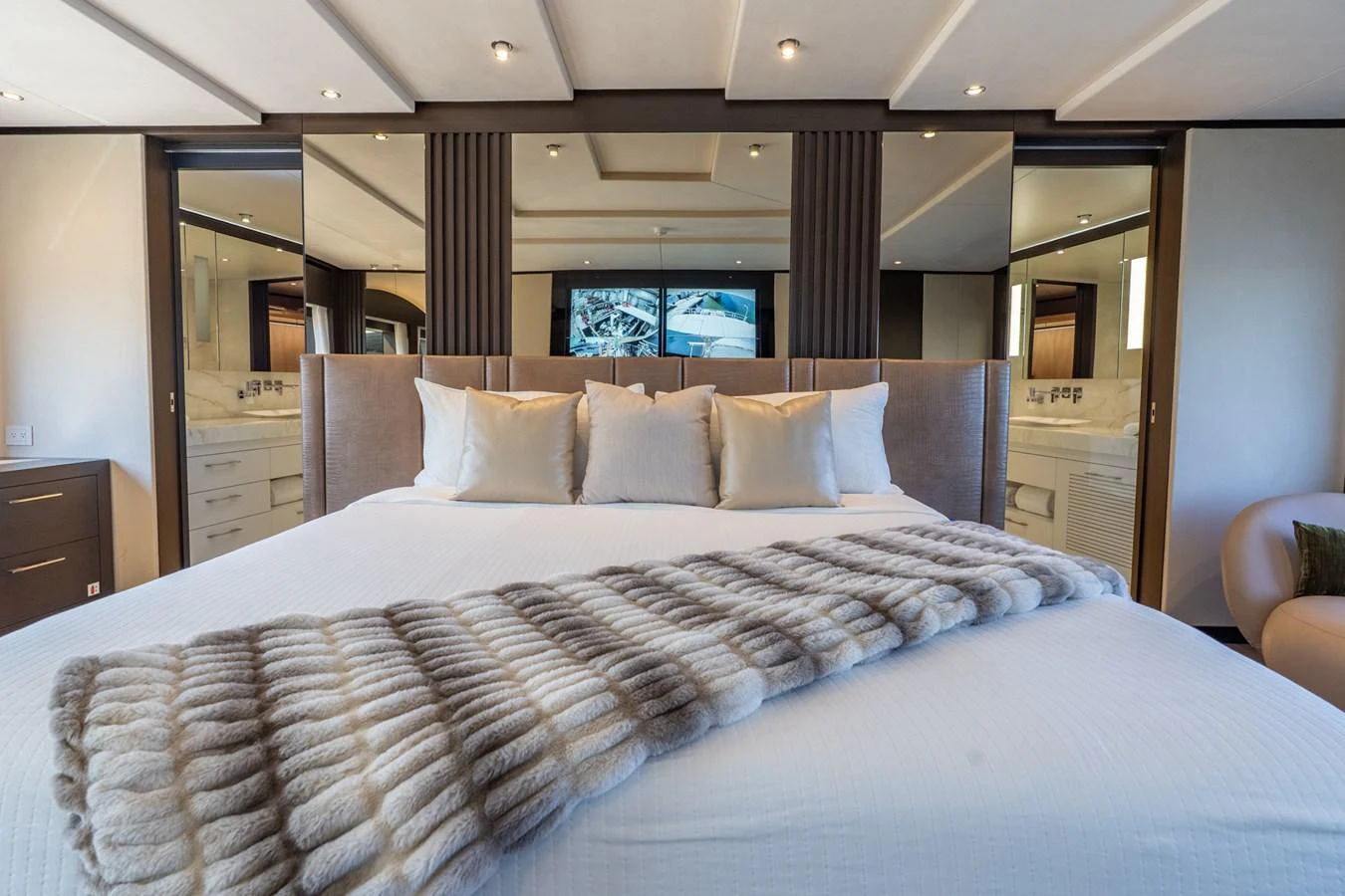 a large bed in a room aboard RESONANCE Yacht for Sale