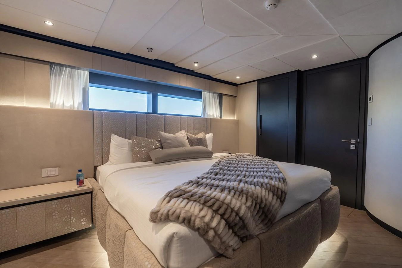 a bed in a room aboard RESONANCE Yacht for Sale