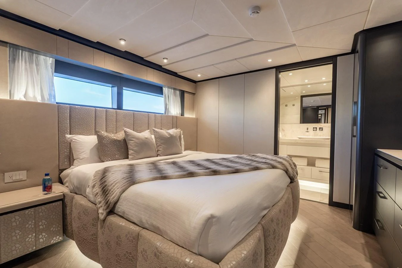 a bed in a room aboard RESONANCE Yacht for Sale