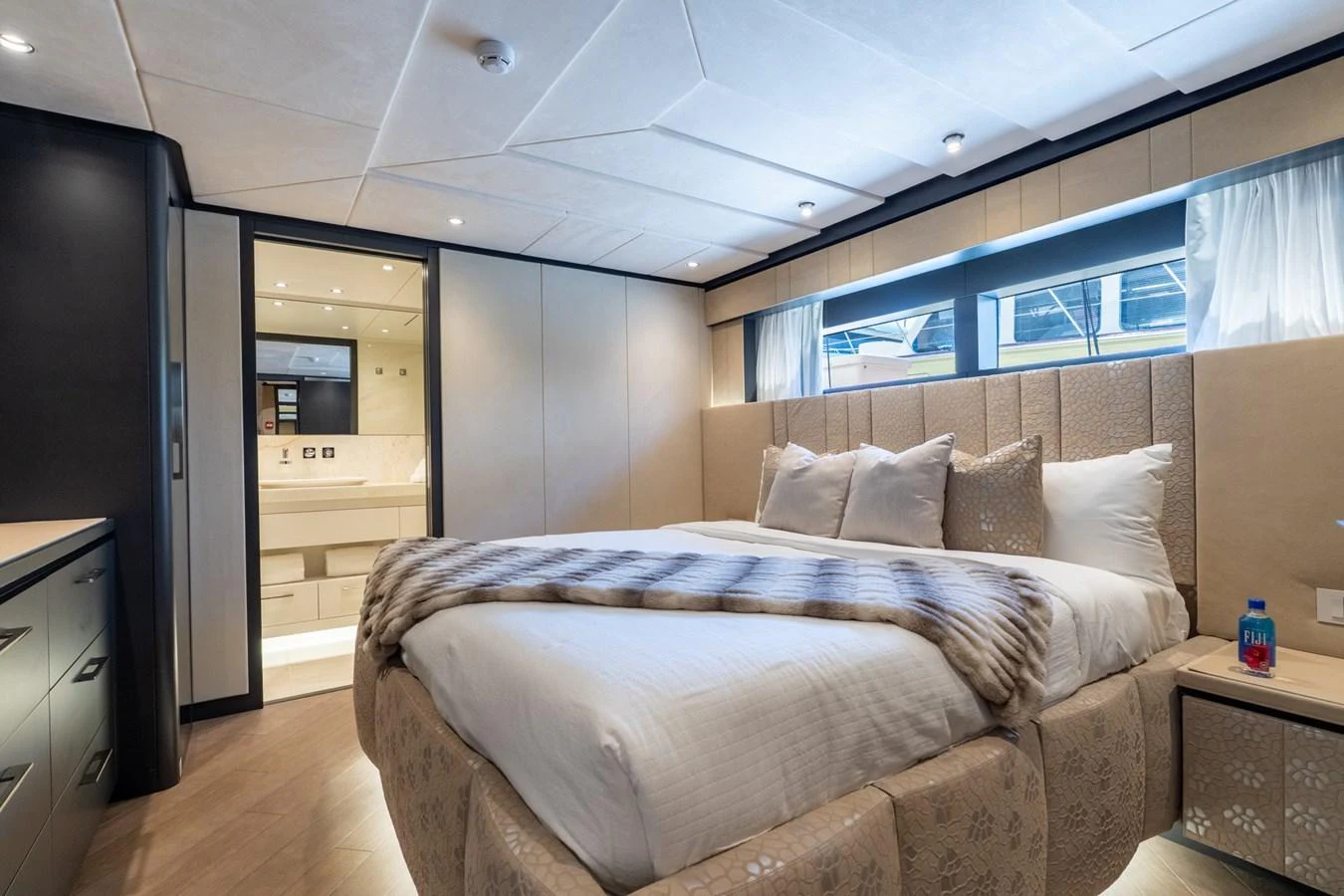 a bed in a room aboard RESONANCE Yacht for Sale