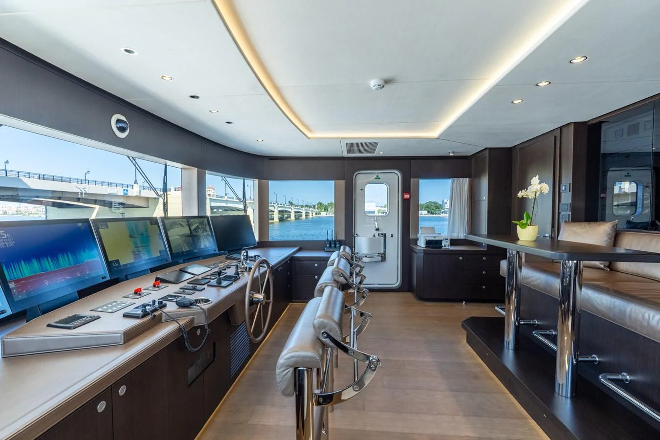 a room with a table and chairs aboard RESONANCE Yacht for Sale