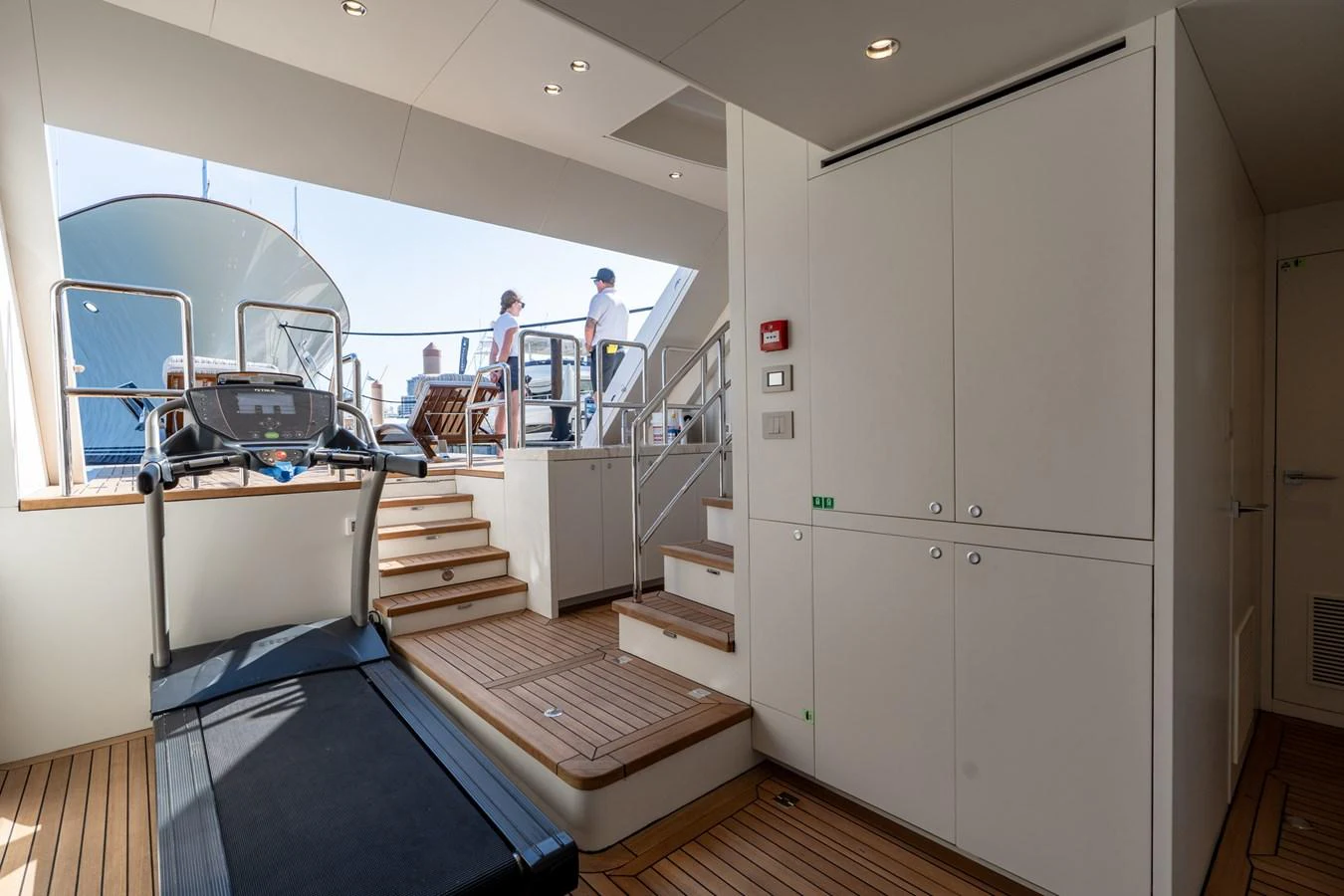 a couple of people in a room aboard RESONANCE Yacht for Sale