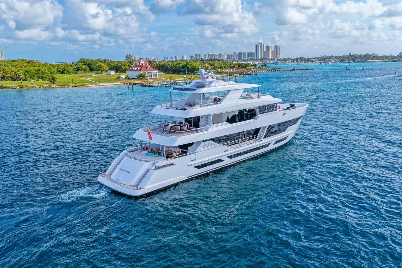 a white boat on the water aboard RESONANCE Yacht for Sale