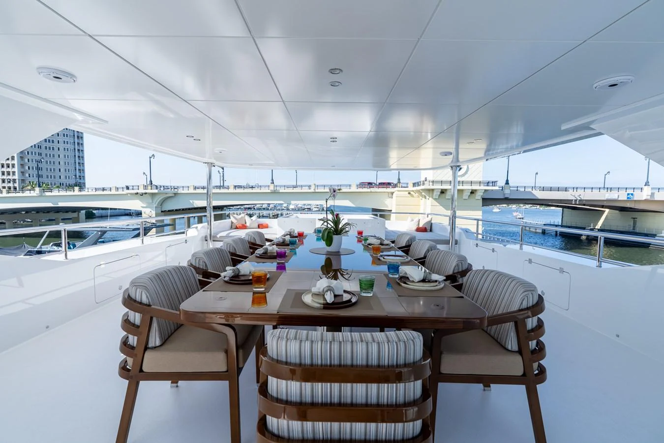 a table with chairs around it aboard RESONANCE Yacht for Sale