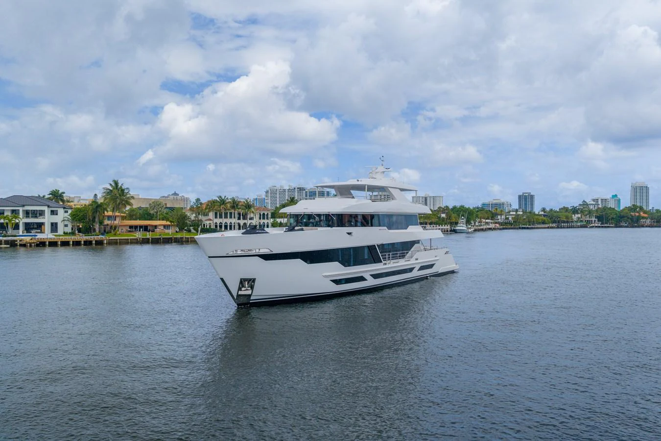 a white boat on the water aboard RESONANCE Yacht for Sale
