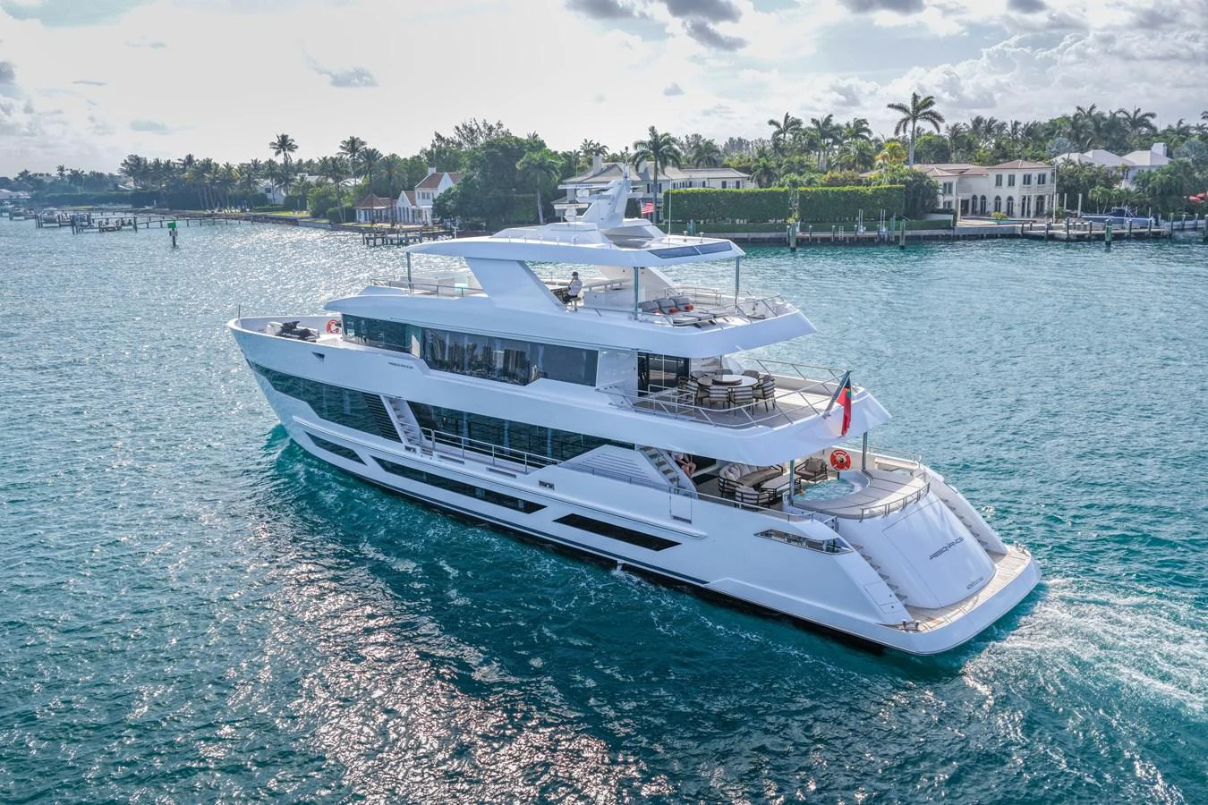 a white boat in the water aboard RESONANCE Yacht for Sale