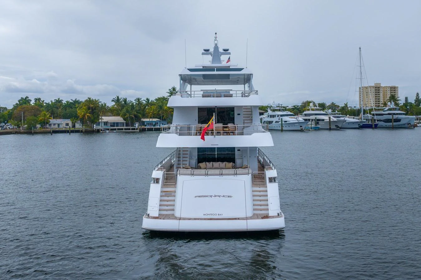 a large white boat in the water aboard RESONANCE Yacht for Sale