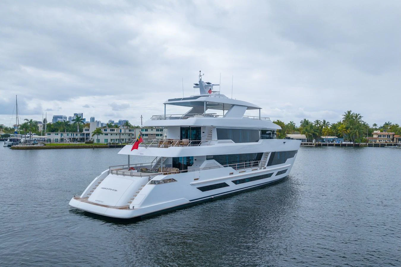 a white boat on the water aboard RESONANCE Yacht for Sale