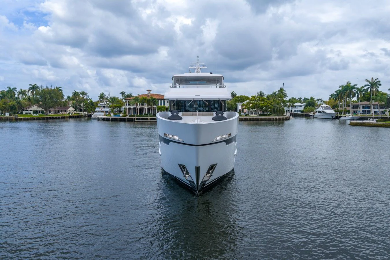 a white boat in the water aboard RESONANCE Yacht for Sale